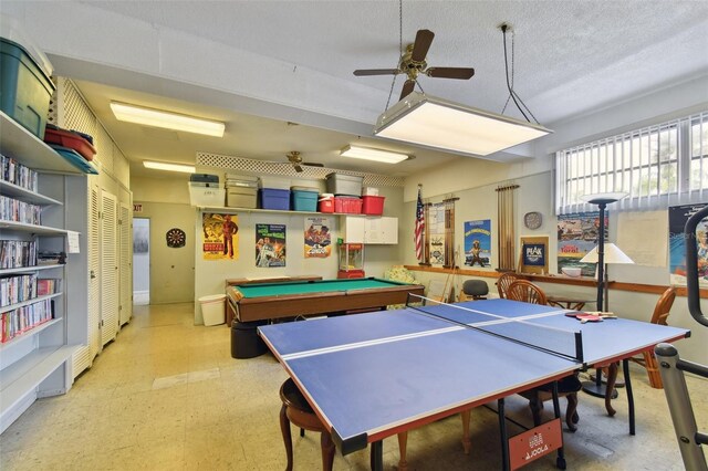 recreation room featuring a textured ceiling, ceiling fan, pool table, and tile patterned floors