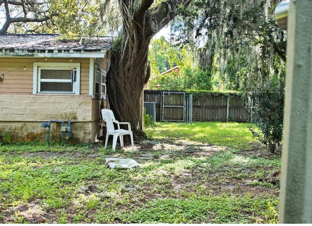 view of yard featuring central AC unit