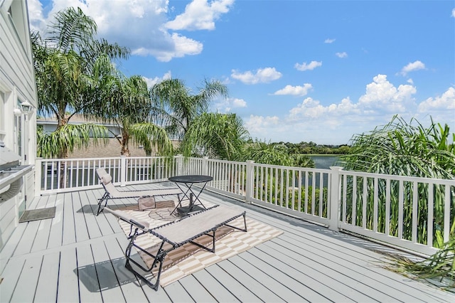 2118 Harbour Watch Dr, Tarpon Springs, FL 34689 - wooden deck featuring a water view