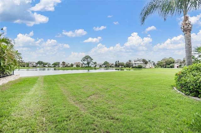 view of yard with a water view