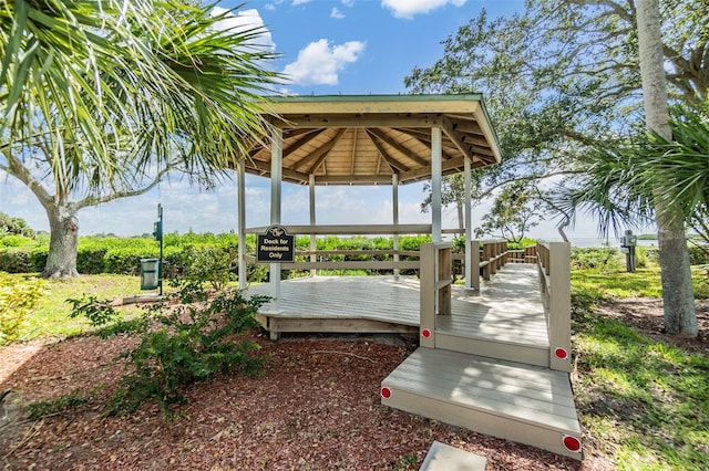 wooden deck featuring a gazebo