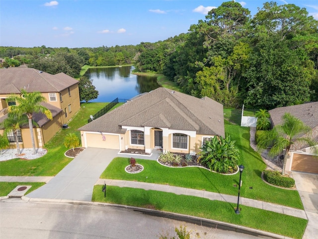 drone / aerial view with a water view