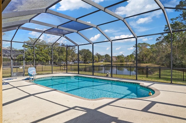 view of pool featuring a lanai, a patio area, and a water view