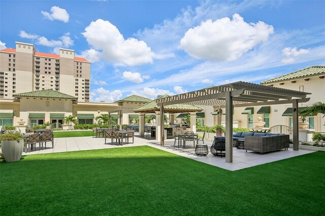 exterior space featuring a patio, a yard, an outdoor hangout area, and a pergola