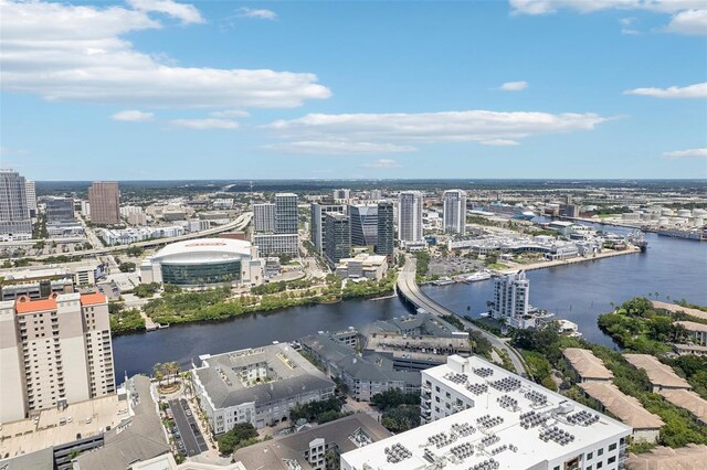 aerial view featuring a view of city and a water view