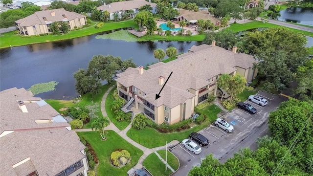 bird's eye view with a water view