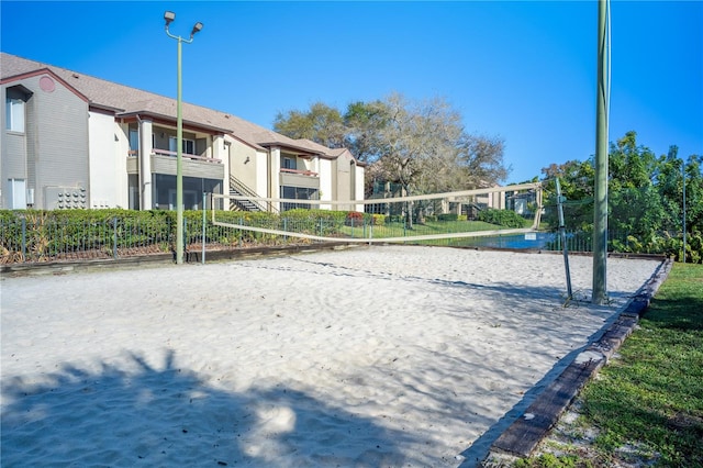 view of property's community with volleyball court