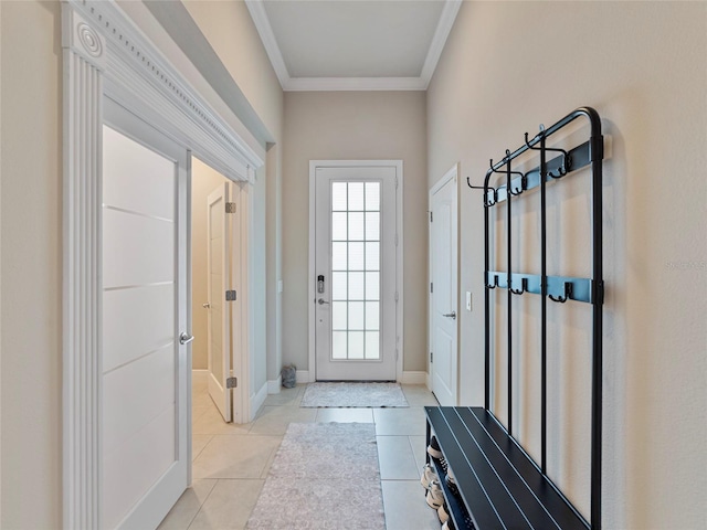 doorway to outside featuring crown molding, a wealth of natural light, and light tile patterned floors