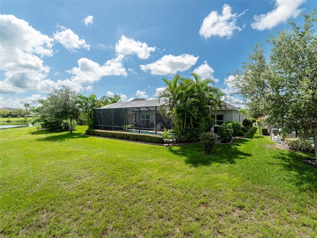 view of yard featuring a lanai