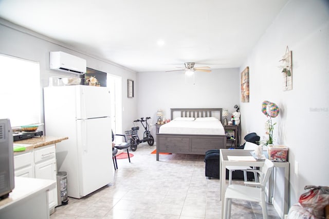 2503 W Marquette Ave, Tampa, FL 33614 - bedroom with freestanding refrigerator, a wall mounted AC, light tile patterned floors, and a ceiling fan