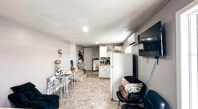 2503 W Marquette Ave, Tampa, FL 33614 - living area featuring an AC wall unit and recessed lighting