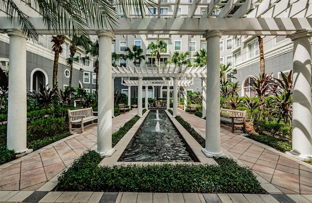 view of property's community with a pergola