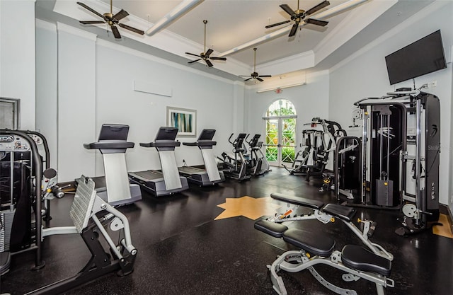 workout area featuring crown molding