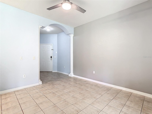 unfurnished room with ceiling fan and light tile patterned flooring