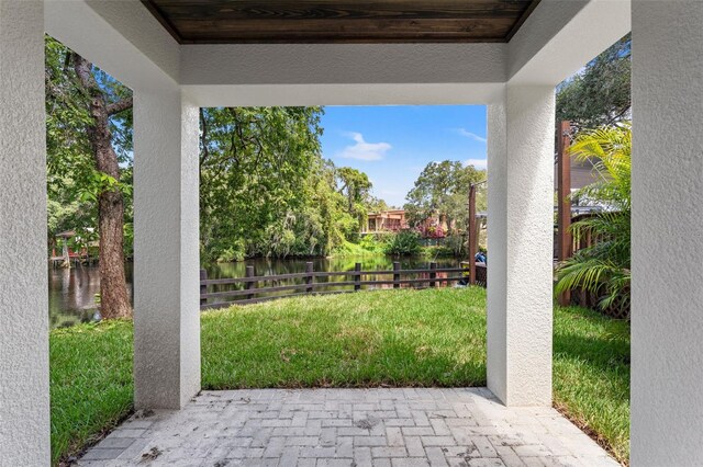 view of patio / terrace with a water view