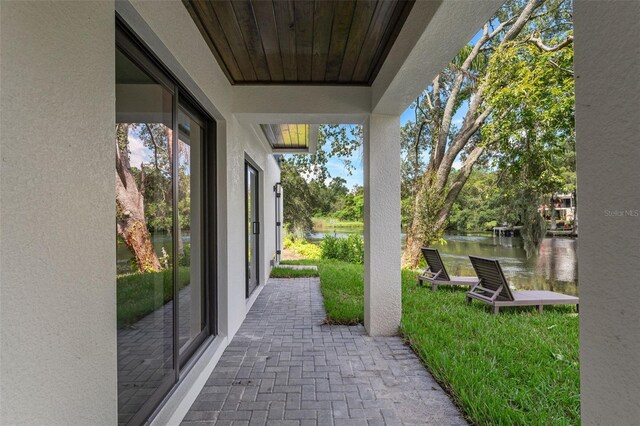 view of patio / terrace featuring a water view