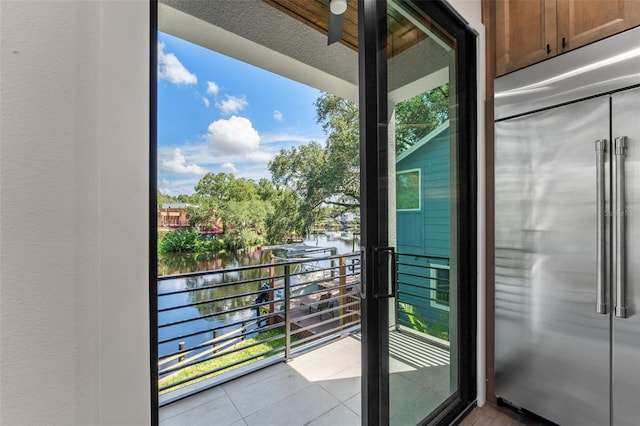 balcony featuring a water view