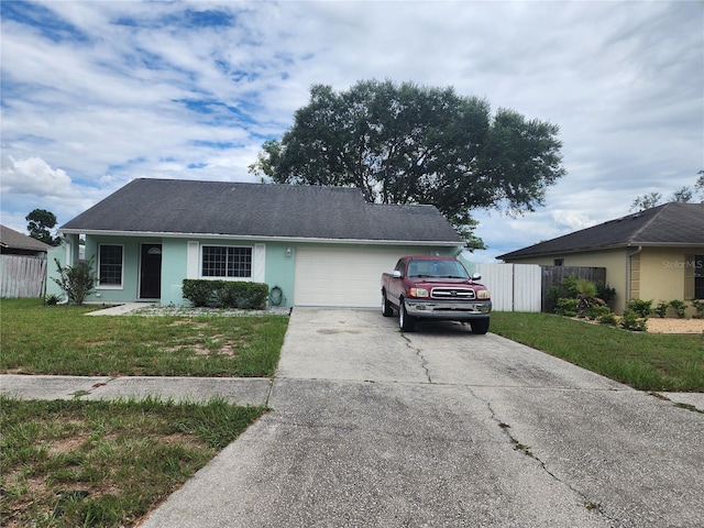 ranch-style house with a front lawn and a garage