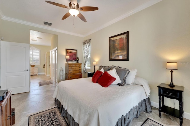 tiled bedroom featuring ceiling fan and ornamental molding