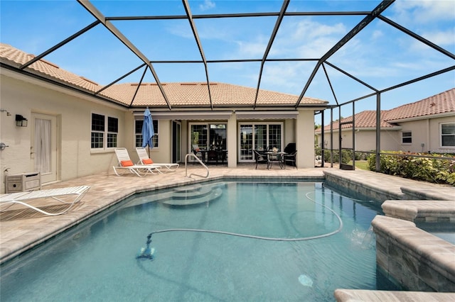 view of pool featuring a lanai and a patio