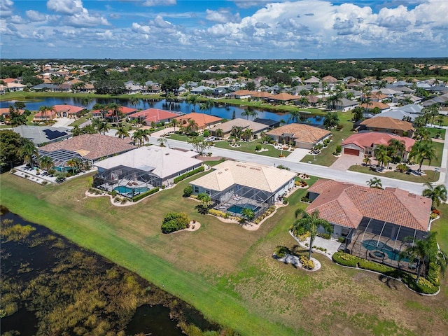 drone / aerial view with a water view