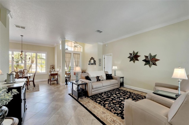 living room featuring french doors, crown molding, a textured ceiling, light tile patterned flooring, and a chandelier