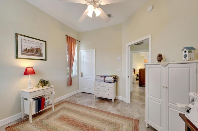 bedroom with light tile patterned floors and ceiling fan