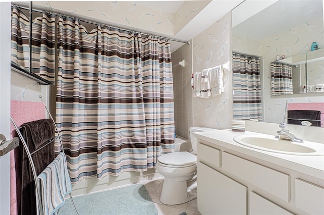 full bathroom featuring shower / bath combo with shower curtain, vanity, toilet, and tile patterned floors