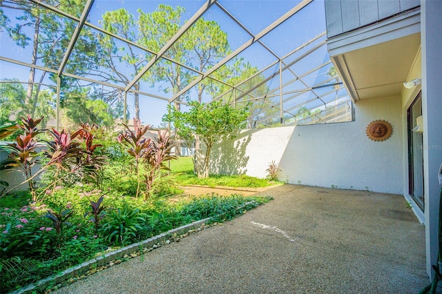 view of patio with a lanai