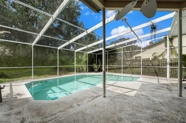 view of pool with a lanai and a patio area