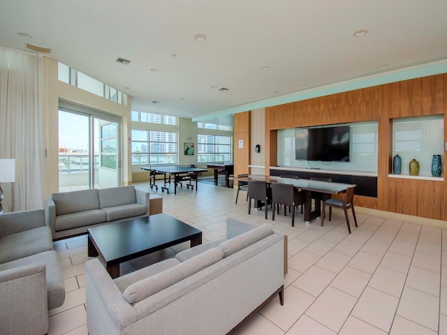 tiled living room with wooden walls