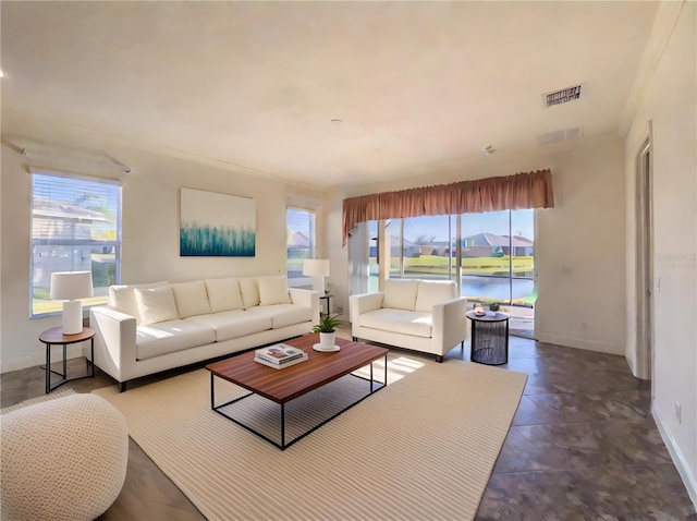 tiled living room featuring a water view and crown molding