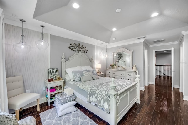 bedroom with dark hardwood / wood-style flooring, crown molding, and vaulted ceiling