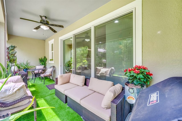 view of patio / terrace with ceiling fan and an outdoor hangout area