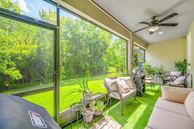 sunroom / solarium with ceiling fan