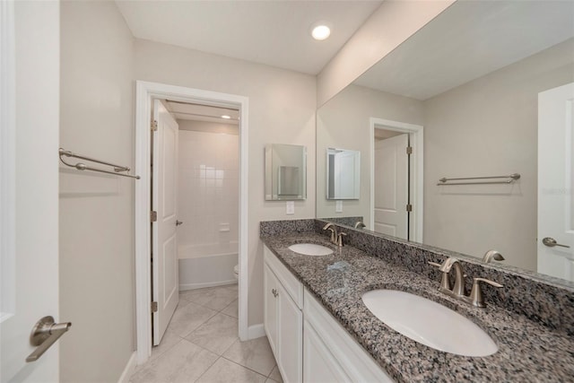 full bathroom with shower / bathtub combination, tile patterned flooring, toilet, and vanity