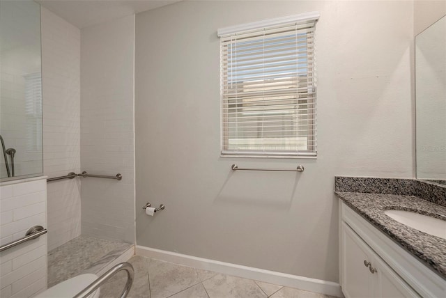 bathroom featuring tile patterned floors, toilet, and vanity