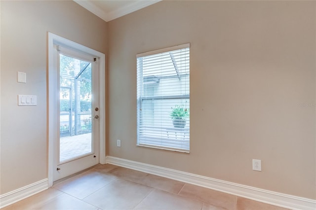 doorway with plenty of natural light and light tile patterned flooring