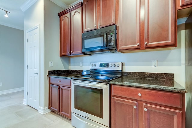 kitchen featuring stainless steel range with electric stovetop, dark stone counters, track lighting, ornamental molding, and light tile patterned flooring