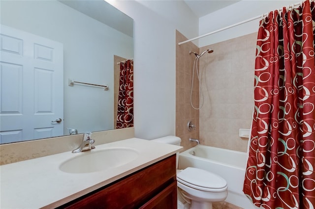 full bathroom with vanity, toilet, and shower / tub combo with curtain