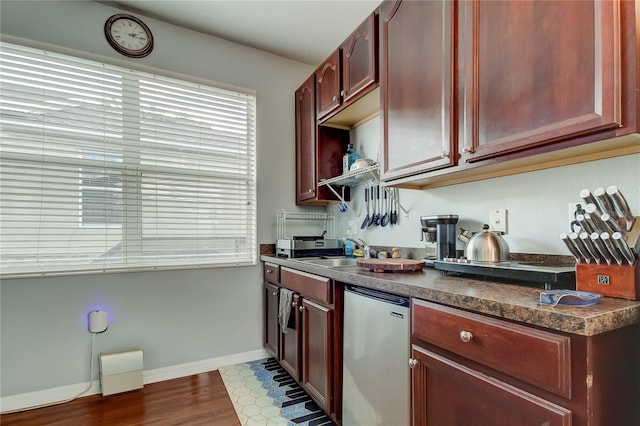 kitchen featuring light hardwood / wood-style flooring, sink, and dishwasher