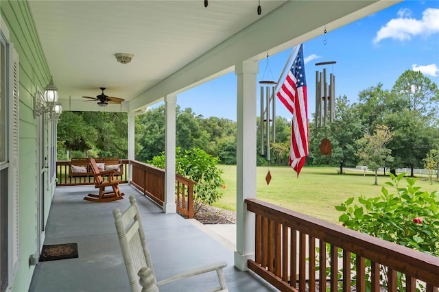 view of patio / terrace with ceiling fan and a porch