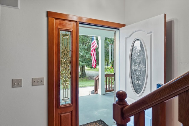 foyer featuring concrete floors