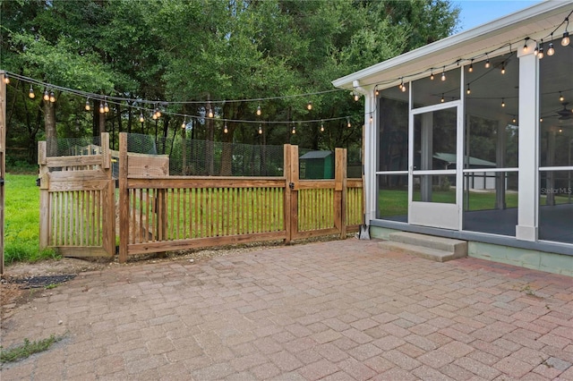 view of patio / terrace with a sunroom