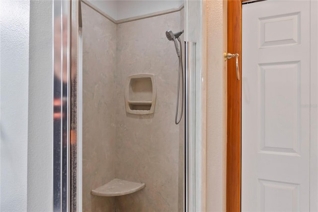 bathroom featuring walk in shower