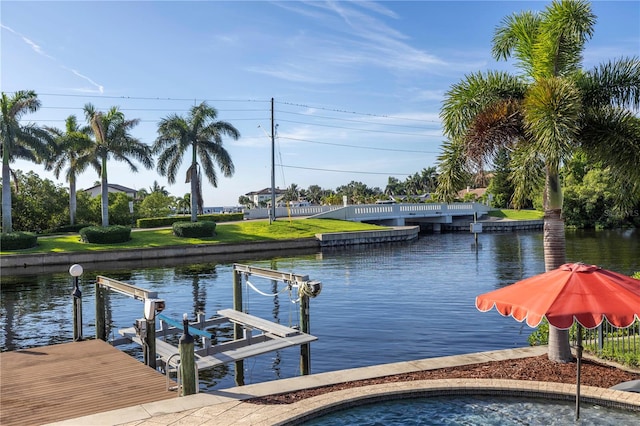 dock area with a water view