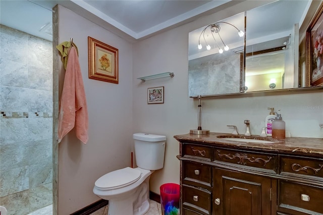 bathroom featuring tile patterned floors, toilet, and vanity