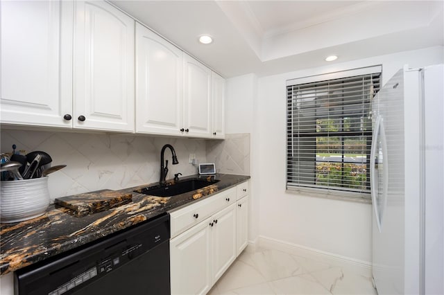 kitchen with black dishwasher, sink, white cabinetry, dark stone countertops, and white refrigerator