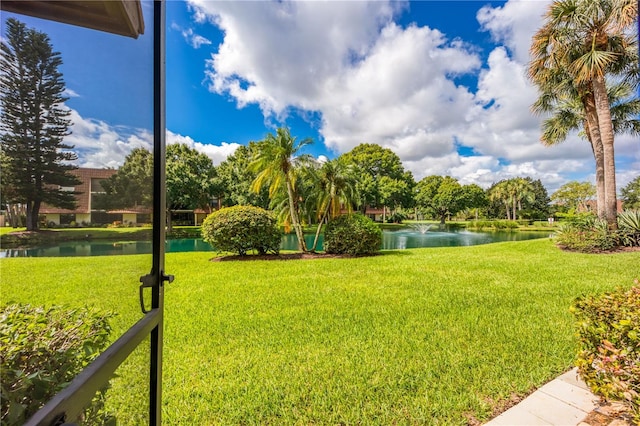 view of yard with a water view