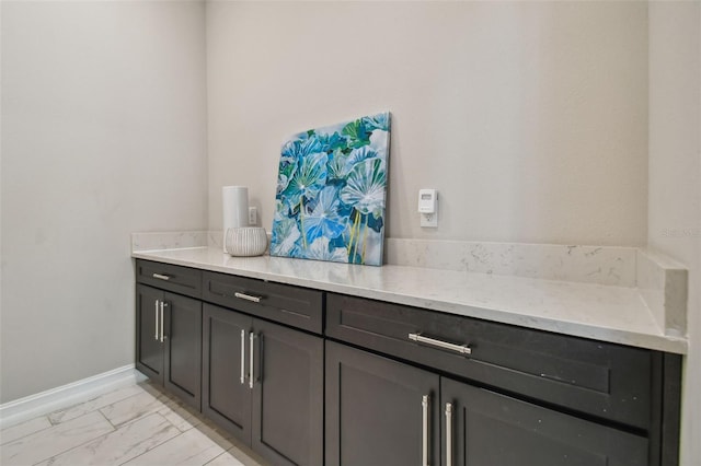 interior space featuring light stone counters